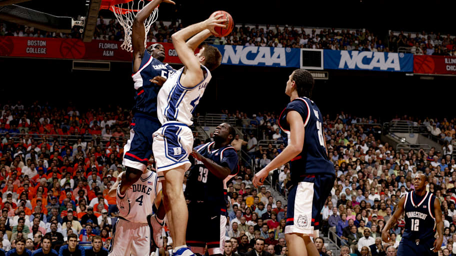 UConn’s Emeka Okafor defends Duke’s Shavlik Randolph’s shot in the 2004 Final Four.
