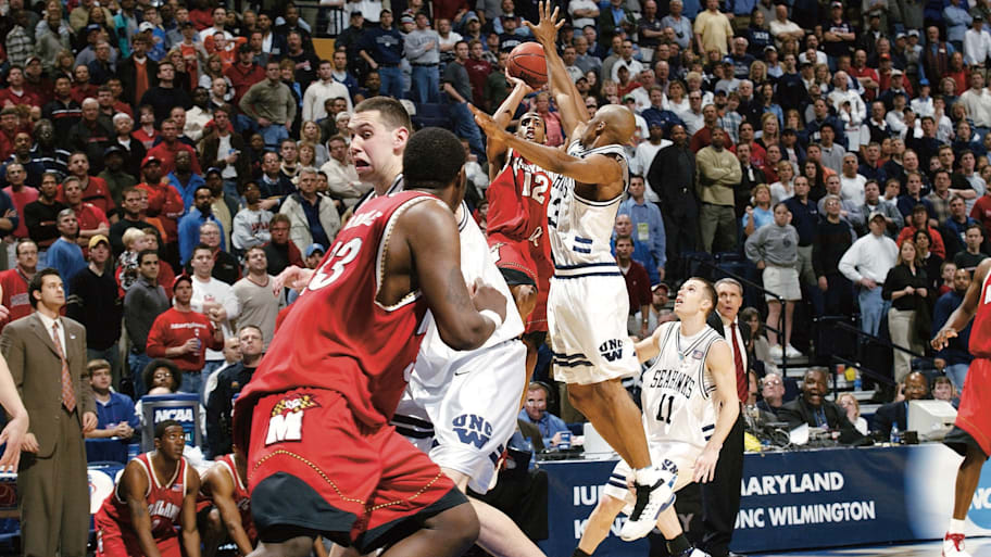 Maryland’s Drew Nicholas fires the winning shot over UNC Wilmington's Anthony Terrell.