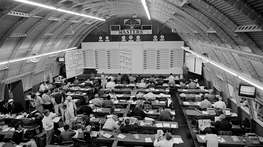 Media working showing the interior of the Press Building inside the Quonset Hut during the first round of the 1984 Masters. 