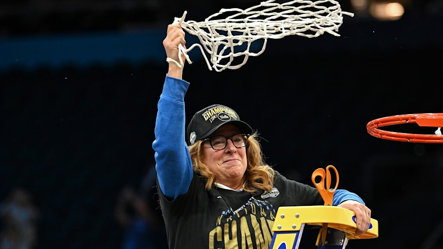 Cori Close cuts down championship net