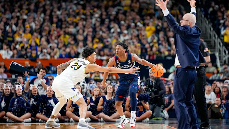 Michigan’s Yaxel Lendeborg defends UConn’s Silas Demary Jr. during the men’s basketball championship game.