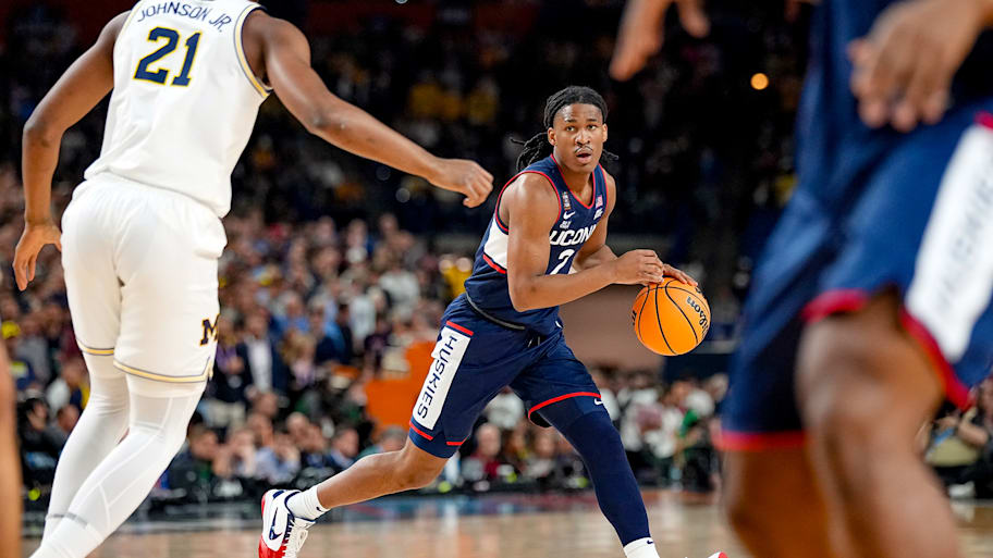 UConn guard Silas Demary Jr. dribbles against Michigan in the title game.