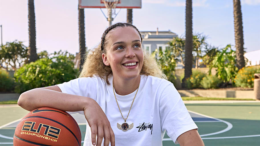 Amalia Holguin poses for a portrait on a local playground court.