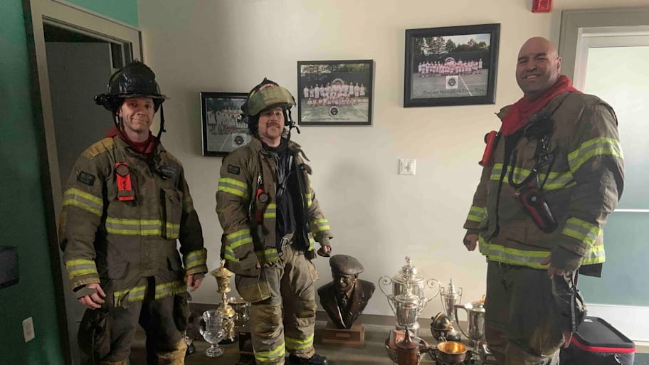 Southfield Fire Department firefighters with trophies