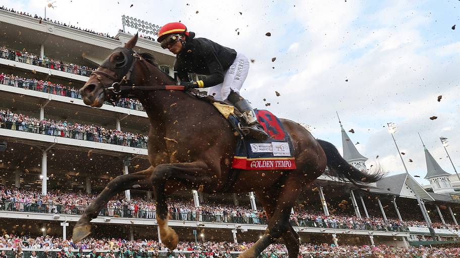 Running last around the final turn, Golden Tempo, charged through the field in a wild stretch run to take the Derby victory.
