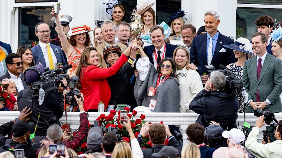 Cherie DeVaux and José Ortiz celebrate after Golden Tempo won the Kentucky Derby.