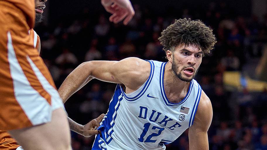 Cameron Boozer dribbles the basketball during a Duke game.