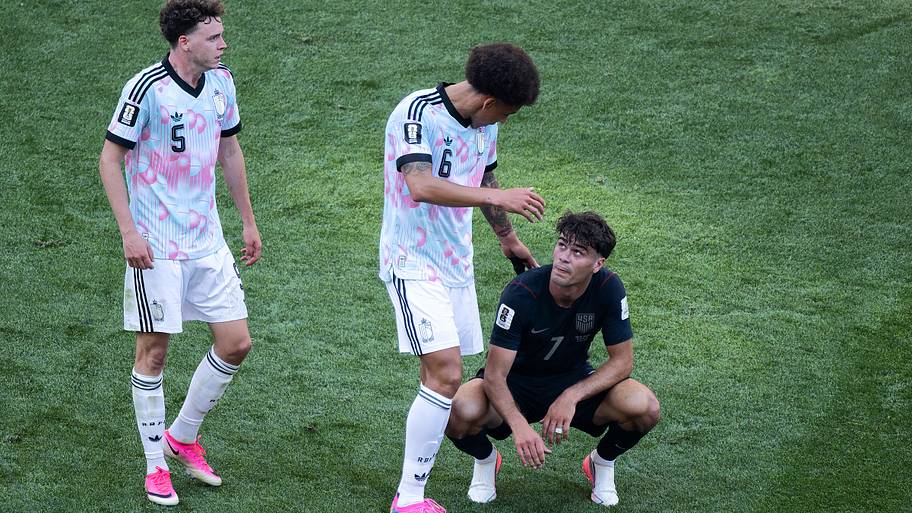 Belgium players greet Gio Reyna