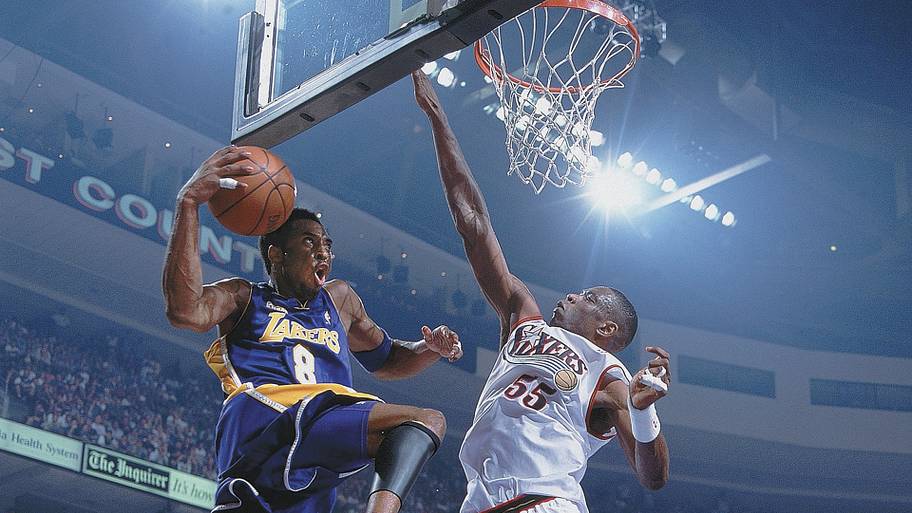 Kobe Bryant flies to the rim against the 76ers