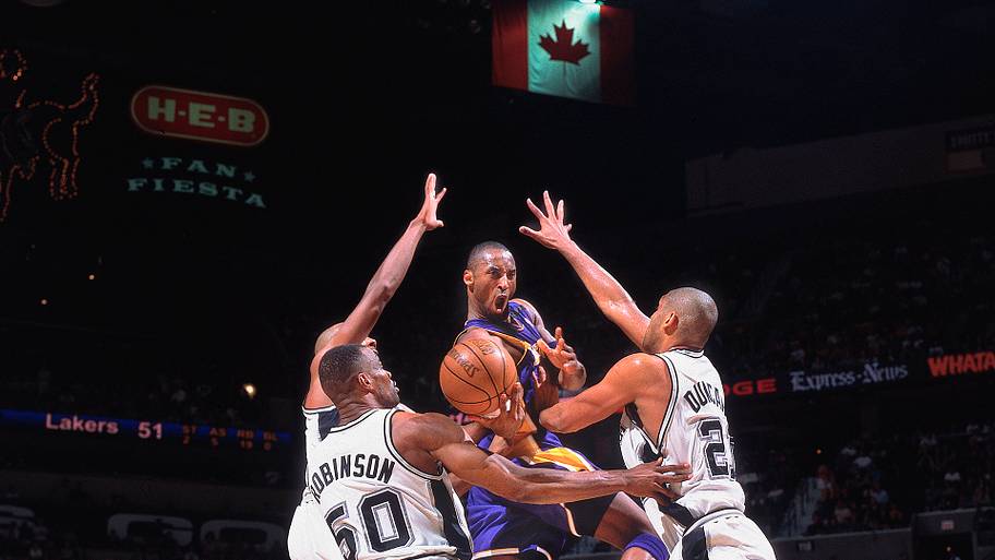 Kobe passes out of a triple team