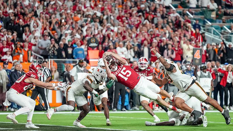 Indiana quarterback Fernando Mendoza scores a fourth-quarter touchdown against Miami in the national championship game.
