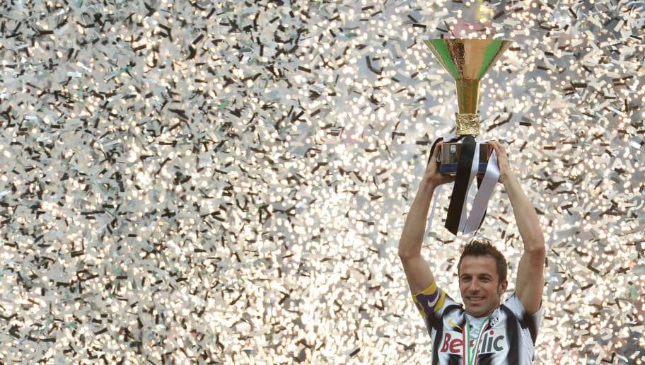 GIUSEPPE CACACE/GettyImages Juventus' forward Alessandro Del Piero celebrates with his team winning the Italian Serie A trophy, the Scudetto, during a ceremony after their match against Atalanta on May 13, 2012 in Juventus stadium in Turin. Juve have officially won 28 titles due to having been stripped of their 2005 and 2006 successes for match-fixing and Del Piero's 19-year stay with the Old Lady Juventus will come to an end this summer. AFP PHOTO / GIUSEPPE CACACE (Photo credit should read GIUSEPPE CACACE/AFP/GettyImages)