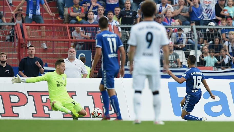 Matthias Hangst/GettyImages KARLSRUHE, GERMANY - MAY 24: Manuel Torres of Karlsruhe scores his team's second goal during the Second Bundesliga match between Karlsruher SC and 1860 Muenchen the at Wildpark Stadium on May 24, 2015 in Karlsruhe, Germany. (Photo by Matthias Hangst/Bongarts/Getty Images)