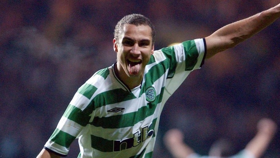 GLASGOW, SCOTLAND: Henrik Larsson celebrates after opening the scoring for Celtic in a UEFA Cup third round match against Valencia in Celtic Park, Glasgow, 06 December 2001. (Photo credit should read IAN STEWART/AFP/Getty Images)