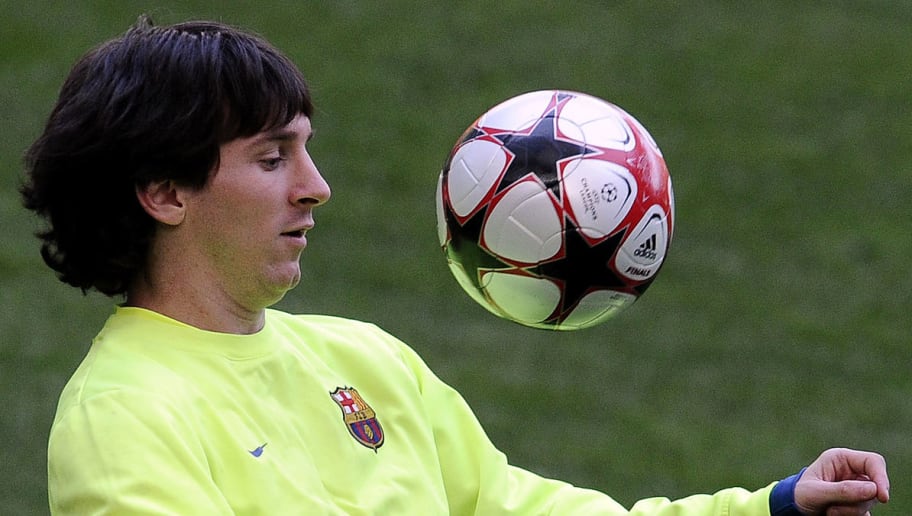 Barcelona's Argentinian forward Lionel Messi eyes the ball during a training session a day before their Champion's League first leg semifinal football match against Inter Milan, in Milan's San Siro Stadium on April 19, 2009. AFP PHOTO / Filippo MONTEFORTE (Photo credit should read FILIPPO MONTEFORTE/AFP/Getty Images)