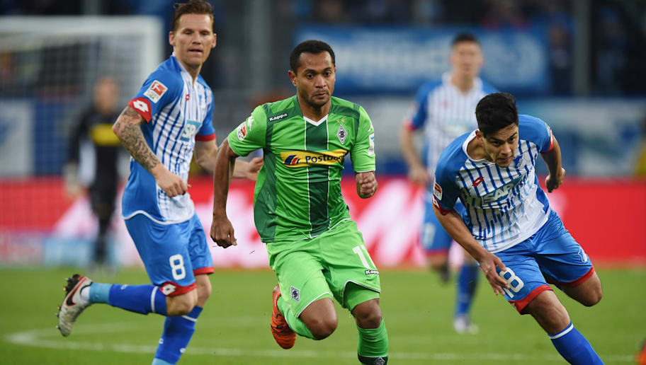 Matthias Hangst/GettyImages SINSHEIM, GERMANY - NOVEMBER 28: Raffael of Gladbach controls the ball against Eugen Polanski of Hoffenheim and Nadiem Amiri of Hoffenheim during the Bundesliga match between 1899 Hoffenheim and Borussia Moenchengladbach at Wirsol Rhein-Neckar-Arena on November 28, 2015 in Sinsheim, Germany. (Photo by Matthias Hangst/Bongarts/Getty Images)