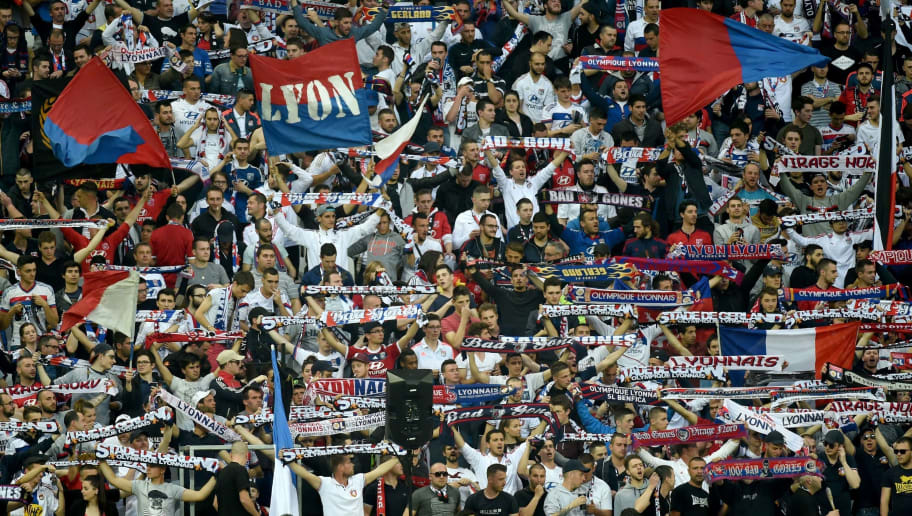 Lyon's fans wave before the French L1 football match between Olympique Lyonnais (OL) and Association sportive de Monaco (ASM) at the Parc de l'Olympique Lyonnais in Decines-Charpieu, central eastern France, on May 7, 2016.  AFP PHOTO / PHILIPPE DESMAZES / AFP / PHILIPPE DESMAZES        (Photo credit should read PHILIPPE DESMAZES/AFP/Getty Images)