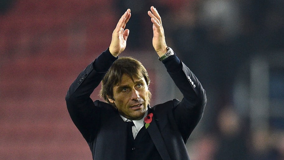 Chelsea's Italian head coach Antonio Conte applauds supporters after the English Premier League football match between Southampton and Chelsea at St Mary's Stadium in Southampton, southern England on October 30, 2016.
Chelsea won the game 2-0. / AFP / GLYN KIRK / RESTRICTED TO EDITORIAL USE. No use with unauthorized audio, video, data, fixture lists, club/league logos or 'live' services. Online in-match use limited to 75 images, no video emulation. No use in betting, games or single club/league/player publications.  /         (Photo credit should read GLYN KIRK/AFP/Getty Images)