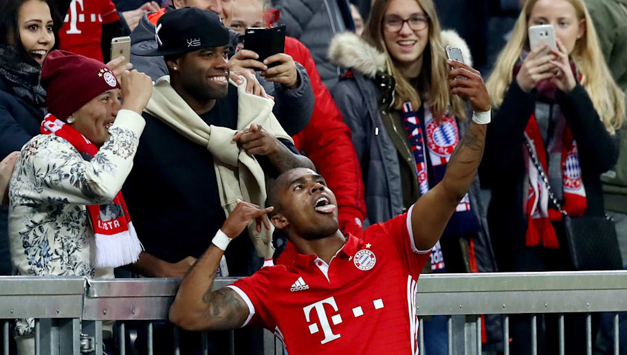 Douglas Costa Tries to Claim Mats Hummels's Bayern Munich ...
