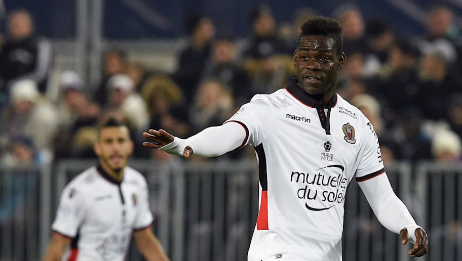 Nice's Italian forward Mario Balotelli gesturesduring the French Ligue 1 football  match between Bordeaux and Nice on December 21, 2016 at the Matmut Atlantique stadium in Bordeaux, southwestern France. / AFP / NICOLAS TUCAT        (Photo credit should read NICOLAS TUCAT/AFP/Getty Images)