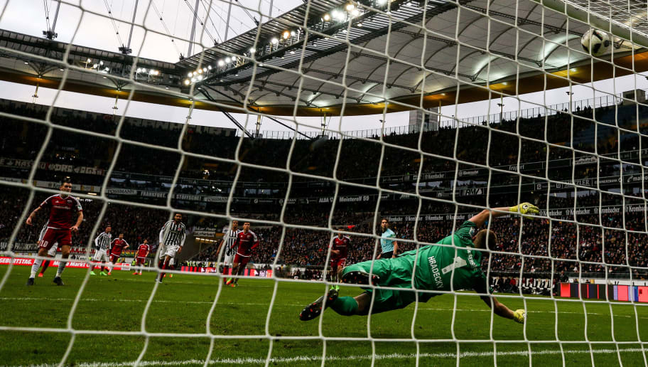 FRANKFURT AM MAIN, GERMANY - FEBRUARY 18: Pascal Gross of Ingolstadt (L) scores penalty shot to make it 0-2 against Lukas Hradecky goal keeper of Frankfurt during the Bundesliga match between Eintracht Frankfurt and FC Ingolstadt 04 at Commerzbank-Arena on February 18, 2017 in Frankfurt am Main, Germany. (Photo by Maja Hitij/Bongarts/Getty Images)