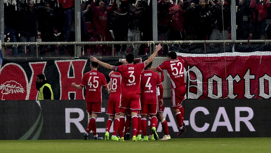 Olympiakos' players celebrate a goal during the UEFA Europa League round of 16 first leg football match between Olympiakos Piraeus and Besiktas in Athens on March 9, 2017.  / AFP PHOTO / ANGELOS TZORTZINIS        (Photo credit should read ANGELOS TZORTZINIS/AFP/Getty Images)