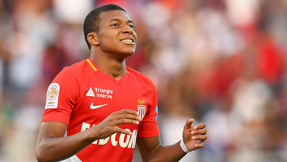FRANCK FIFE/GettyImages Monaco's French forward Kylian Mbappe reacts after missing a goal opportunity during the French Trophy of Champions (Trophee des Champions) football match between Monaco (ASM) and Paris Saint-Germain (PSG) on July 29, 2017, at the Grand Stade in Tangiers. / AFP PHOTO / FRANCK FIFE (Photo credit should read FRANCK FIFE/AFP/Getty Images)
