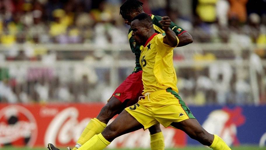 Ben Radford/GettyImages 22 Jan 2000: Samuel Johnson of Ghana and Joseph Desire Job of Cameroon in action in the African Nations Cup game played in Accra, Ghana. The match ended 1-1. \ Mandatory Credit: Ben Radford /Allsport
