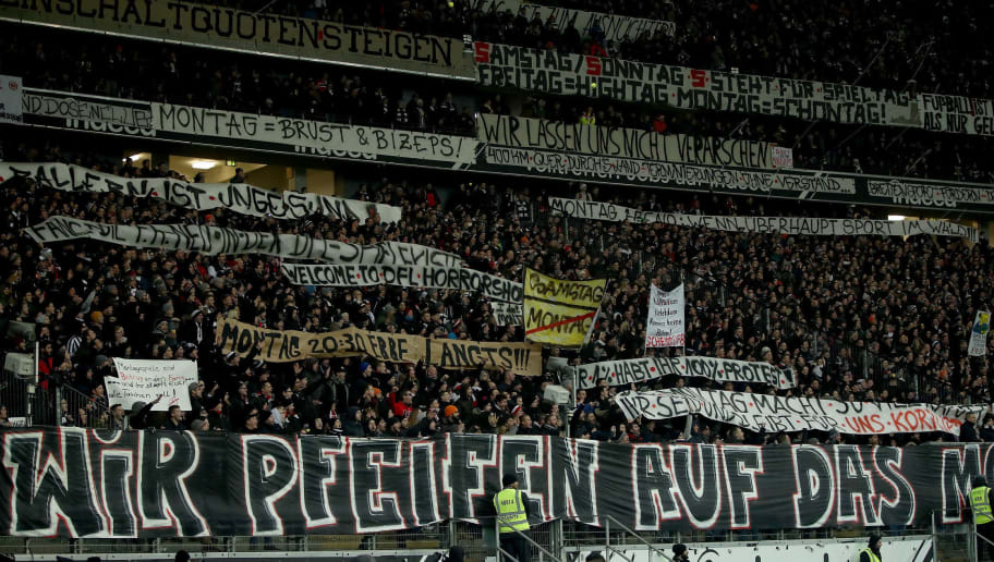 FRANKFURT AM MAIN, GERMANY - FEBRUARY 19:  Fans of Eintracht Frankfurt protest against the ongoing changes to kick off times ahead the Bundesliga match between between Eintracht Frankfurt and RB Leipzig at Commerzbank-Arena on February 19, 2018 in Frankfurt am Main, Germany. Fans are calling for a return to the standard kick off time of 15:30 on Saturday. All changes made by the League council were accompanied by large but non-violent protests.  (Photo by Alex Grimm/Bongarts/Getty Images)