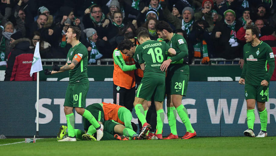 BREMEN, GERMANY - FEBRUARY 24: Players of Bremen celebrate after Ishak Belfodil of Bremen scored a goal to make it 1:0 during the Bundesliga match between SV Werder Bremen and Hamburger SV at Weserstadion on February 24, 2018 in Bremen, Germany. (Photo by Stuart Franklin/Bongarts/Getty Images)
