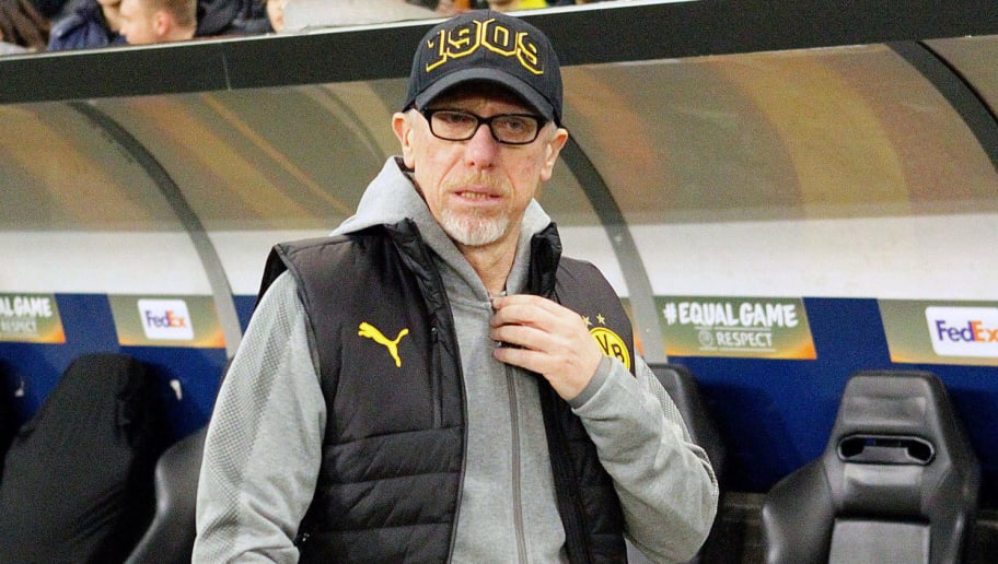 (L-R) Borussia Dortmund's head coach Peter Stöger react after the Europa League Round of 16 second leg football match between FC Salzburg and BV 09 Borussia Dortmund in Salzburg, Austria, on March 15, 2018.   / AFP PHOTO / APA / KRUGFOTO / Austria OUT        (Photo credit should read KRUGFOTO/AFP/Getty Images)