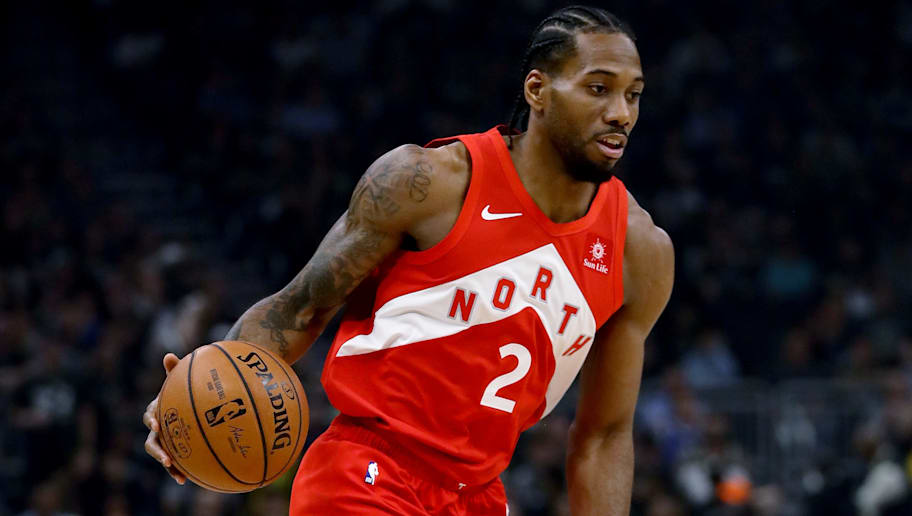 MILWAUKEE, WISCONSIN - MAY 23:  Kawhi Leonard #2 of the Toronto Raptors dribbles the ball in the first quarter against the Milwaukee Bucks during Game Five of the Eastern Conference Finals of the 2019 NBA Playoffs at the Fiserv Forum on May 23, 2019 in Milwaukee, Wisconsin. NOTE TO USER: User expressly acknowledges and agrees that, by downloading and or using this photograph, User is consenting to the terms and conditions of the Getty Images License Agreement. (Photo by Jonathan Daniel/Getty Images)