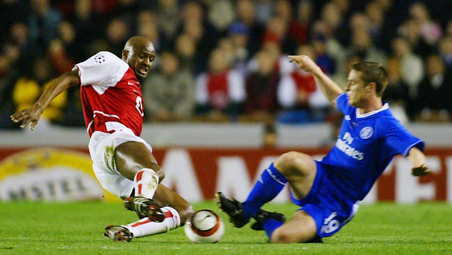 ADRIAN DENNIS/GettyImages Arsenal's Patrick Vieira (L) and Chelsea