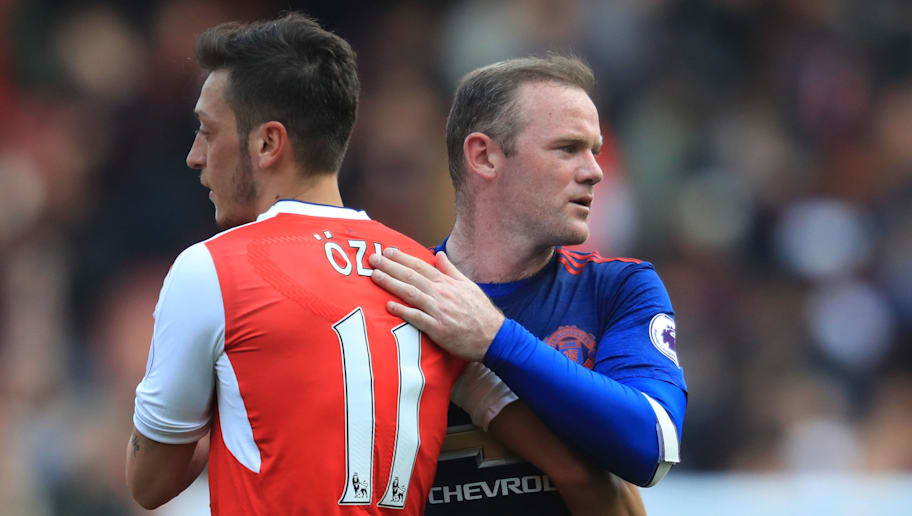 Richard Heathcote/GettyImages Mesut Ozil,Wayne Rooney