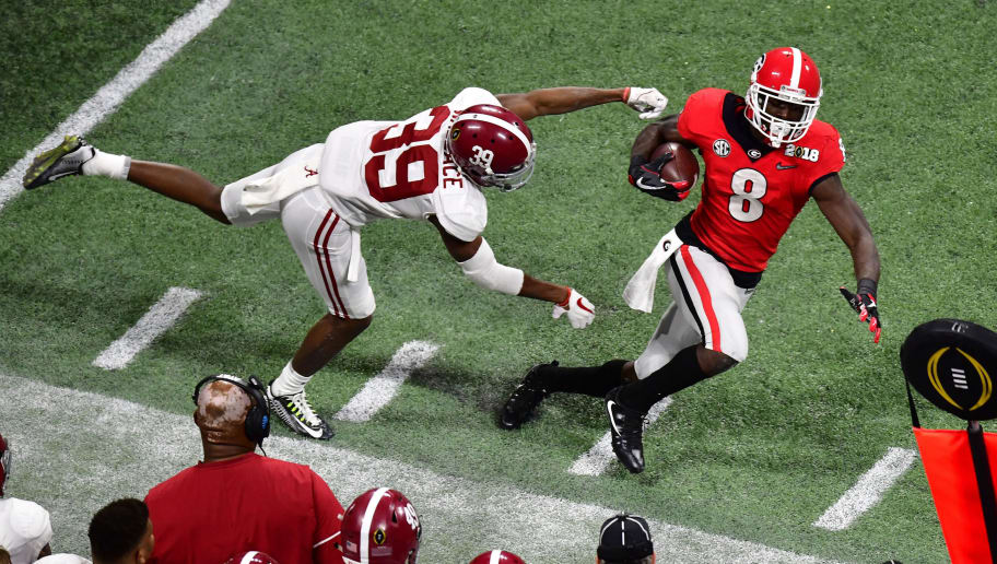 ATLANTA, GA - JANUARY 08: Riley Ridley #8 of the Georgia Bulldogs is forced out of bounds by Levi Wallace #39 of the Alabama Crimson Tide in the CFP National Championship presented by AT&T at Mercedes-Benz Stadium on January 8, 2018 in Atlanta, Georgia. (Photo by Scott Cunningham/Getty Images)