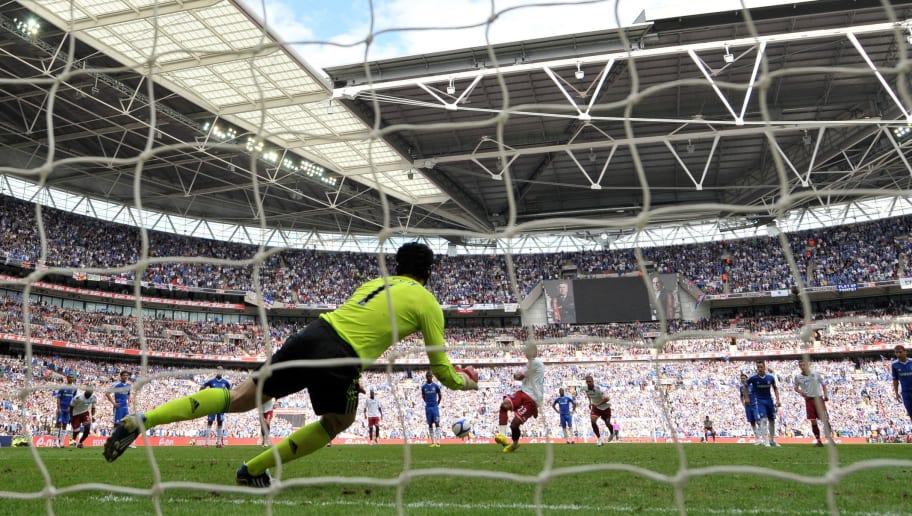 Chelsea goalkeeper Petr Cech (L) saves a