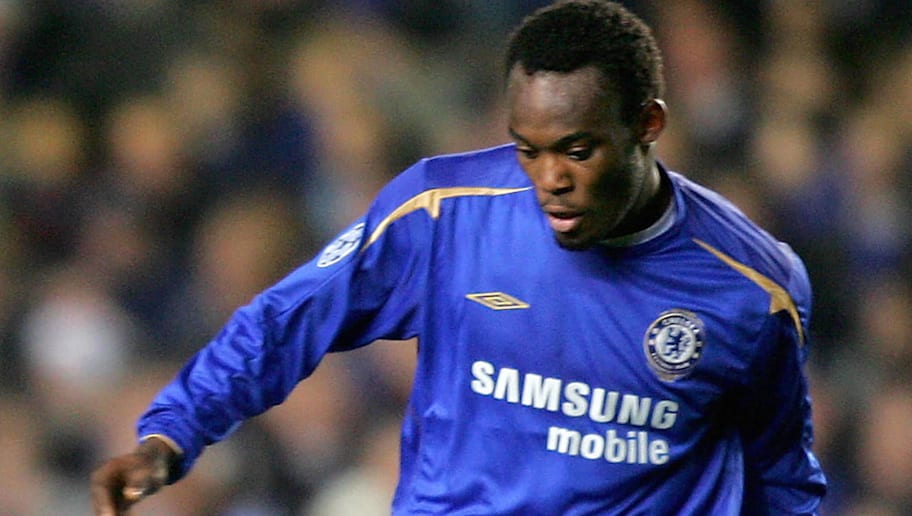 Chelsea's Michael Essien controls the ba