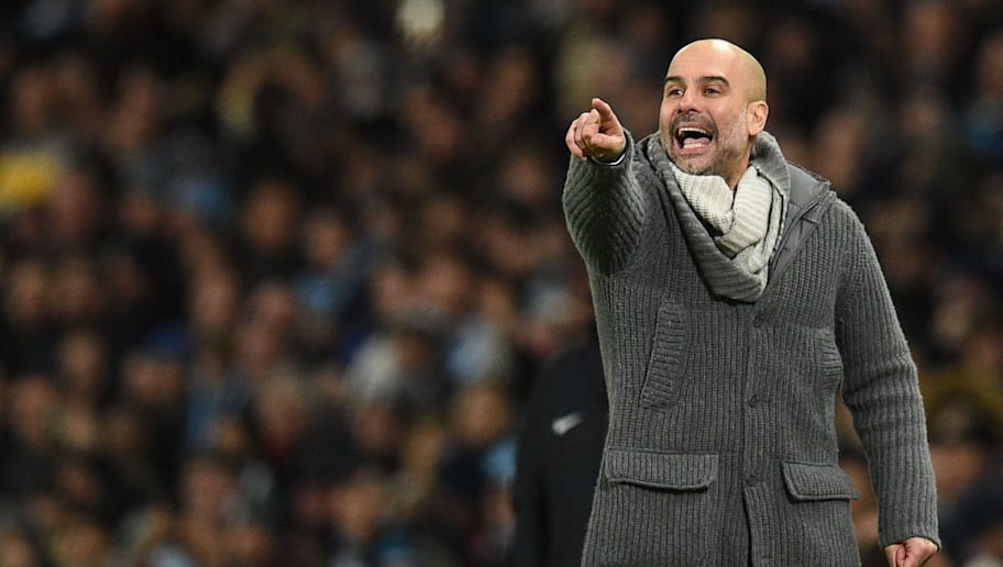 OLI SCARFF/GettyImages FBL-ENG-PR-MAN CITY-ARSENAL