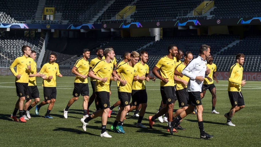 Young Boys' players run during a training session on the eve of the UEFA Champions League group stage H football match between Young Boys and Manchester United at the Stade de Suisse stadium on September 18, 2018 in Bern. (Photo by Fabrice COFFRINI / AFP)        (Photo credit should read FABRICE COFFRINI/AFP/Getty Images)