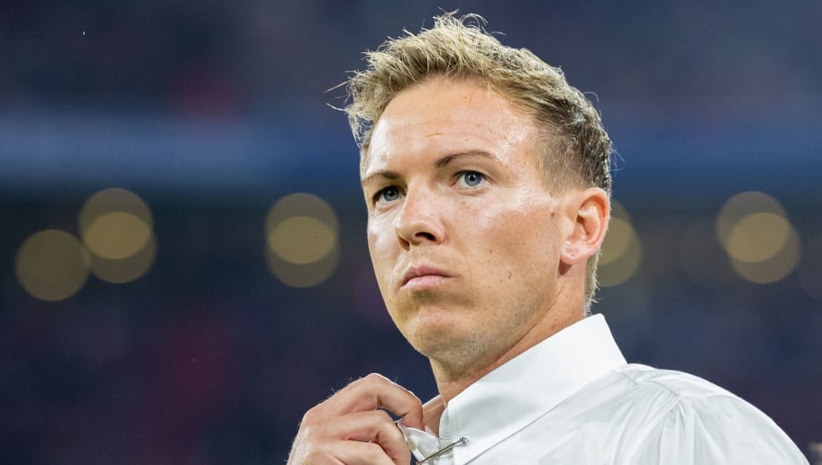 MUNICH, GERMANY - AUGUST 24: Head coach Julian Nagelsmann of TSG Hoffenheim looks on prior to the Bundesliga match between FC Bayern Muenchen and TSG 1899 Hoffenheim at Allianz Arena on August 24, 2018 in Munich, Germany. (Photo by Boris Streubel/Getty Images)