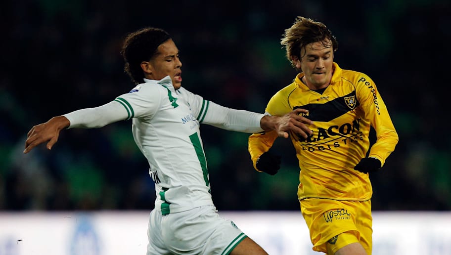 Dean Mouhtaropoulos/GettyImages Robert Cullen,Virgil van Dijk