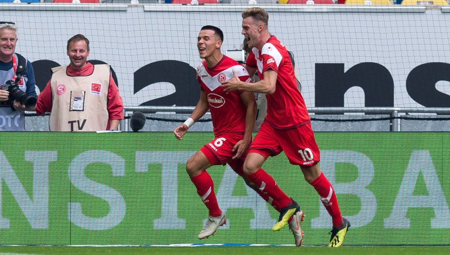 DUESSELDORF, GERMANY - SEPTEMBER 15: Alfredo Morales of Fortuna Duesseldorf celebrates after scoring his team`s first goal with team mate Marvin Ducksch of Fortuna Duesseldorf during the Bundesliga match between Fortuna Duesseldorf and TSG 1899 Hoffenheim at Esprit-Arena on September 15, 2018 in Duesseldorf, Germany. (Photo by TF-Images/TF-Images via Getty Images)