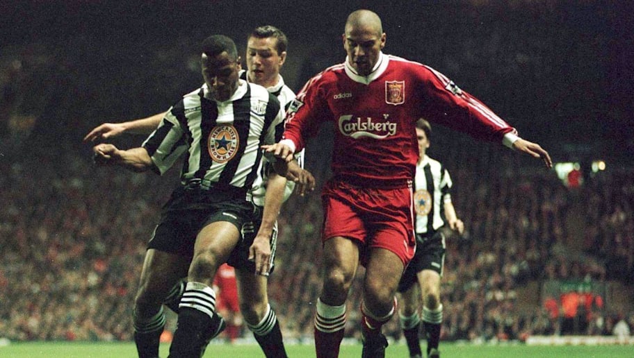 3 Apr 1996:  Stan Collymore of Liverpool battles for the ball with Les Ferdinand of Newcastle United during their FA Premiership game at Anfield, Liverpool. Mandatory Credit: Allsport UK/Allsport