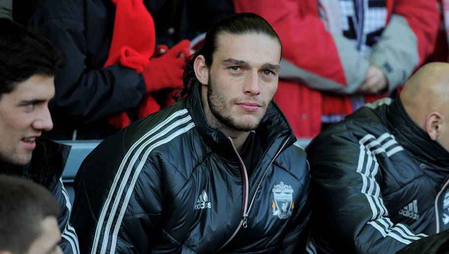 LIVERPOOL, ENGLAND - JANUARY 14: Andy Carroll of Liverpool looks on from the bench prior to the Barclays Premier League match between Liverpool and Stoke City at Anfield on January 14, 2012 in Liverpool, England. (Photo by Michael Regan/Getty Images)