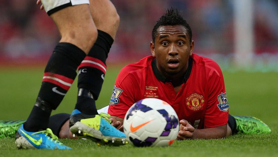 MANCHESTER, ENGLAND - AUGUST 09: Anderson of Manchester United keeps a close eye on the ball during the Rio Ferdinand Testimonial Match between Manchester United and Sevilla at Old Trafford on August 9, 2013 in Manchester, England. (Photo by Clive Brunskill/Getty Images)