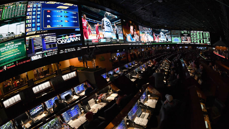 LAS VEGAS, NV - MARCH 15:  Guests attend a viewing party for the NCAA Men's College Basketball Tournament inside the 25,000-square-foot Race & Sports SuperBook at the Westgate Las Vegas Resort & Casino which features 4,488-square-feet of HD video screens on March 15, 2018 in Las Vegas, Nevada.  (Photo by Ethan Miller/Getty Images)
