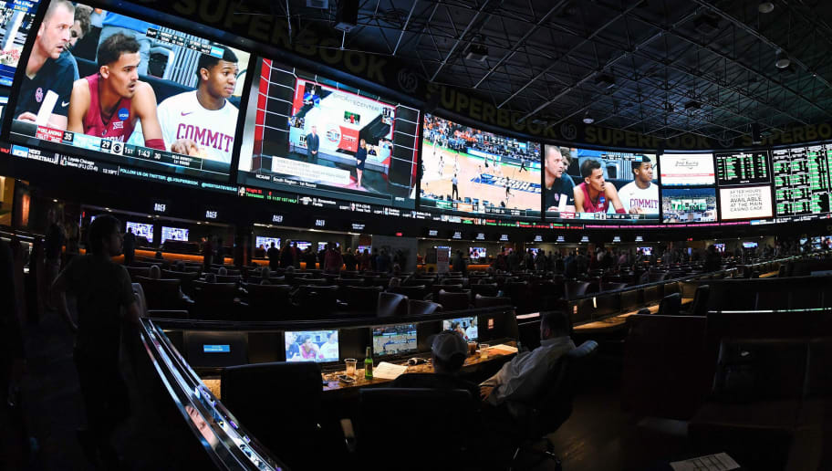 LAS VEGAS, NV - MARCH 15:  Guests attend a viewing party for the NCAA Men's College Basketball Tournament inside the 25,000-square-foot Race & Sports SuperBook at the Westgate Las Vegas Resort & Casino which features 4,488-square-feet of HD video screens on March 15, 2018 in Las Vegas, Nevada.  (Photo by Ethan Miller/Getty Images)