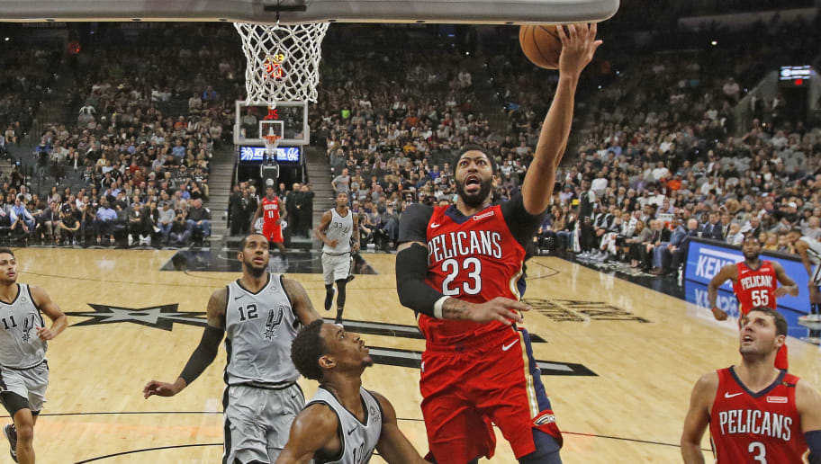 SAN ANTONIO,TX - NOVEMBER 3:  Anthony Davis #23 of the New Orleans Pelicans scores over DeMar DeRozan #10 of the San Antonio Spurs at AT&T Center on November 3 , 2018 in San Antonio, Texas.  NOTE TO USER: User expressly acknowledges and agrees that , by downloading and or using this photograph, User is consenting to the terms and conditions of the Getty Images License Agreement. (Photo by Ronald Cortes/Getty Images)