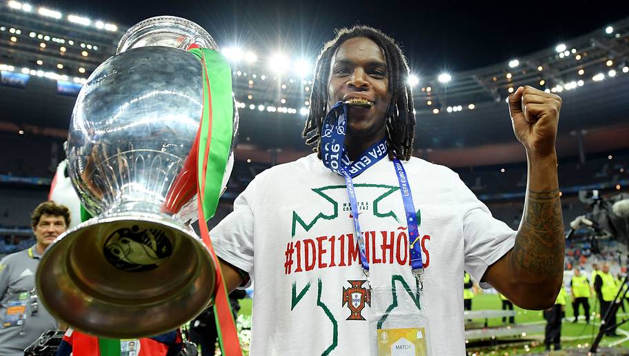 PARIS, FRANCE - JULY 10: Renato Sanches of Portugal holds the Henri Delaunay trophy to celebrate after his team's 1-0 win against France in the UEFA EURO 2016 Final match between Portugal and France at Stade de France on July 10, 2016 in Paris, France. (Photo by Matthias Hangst/Getty Images)