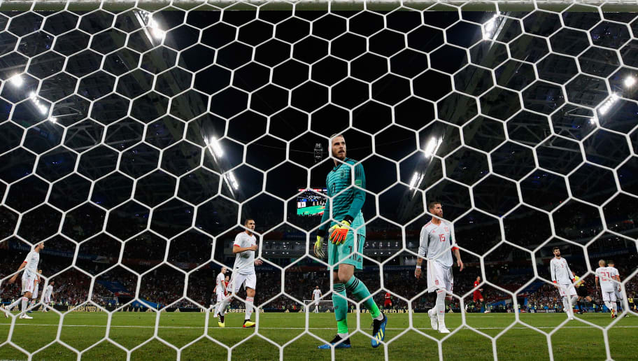 SOCHI, RUSSIA - JUNE 15:  Goalkeeper, David De Gea of Spain looks dejected after Cristiano Ronaldo (not in frame) of Portugal shoots past him and scores his team's second goal during the 2018 FIFA World Cup Russia group B match between Portugal and Spain at Fisht Stadium on June 15, 2018 in Sochi, Russia.  (Photo by Dean Mouhtaropoulos/Getty Images)